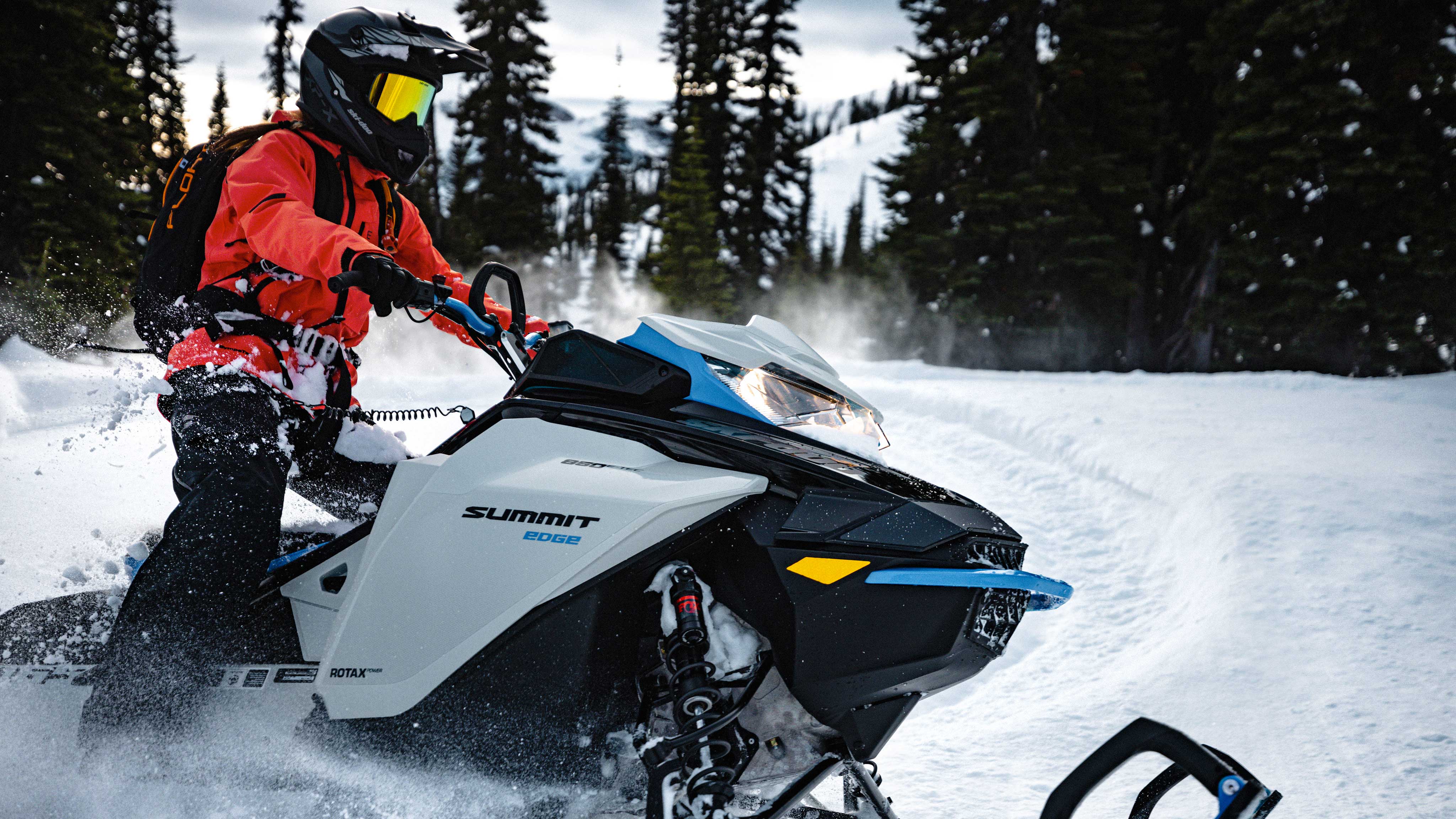 Man driving 2022 Ski-Doo Summit